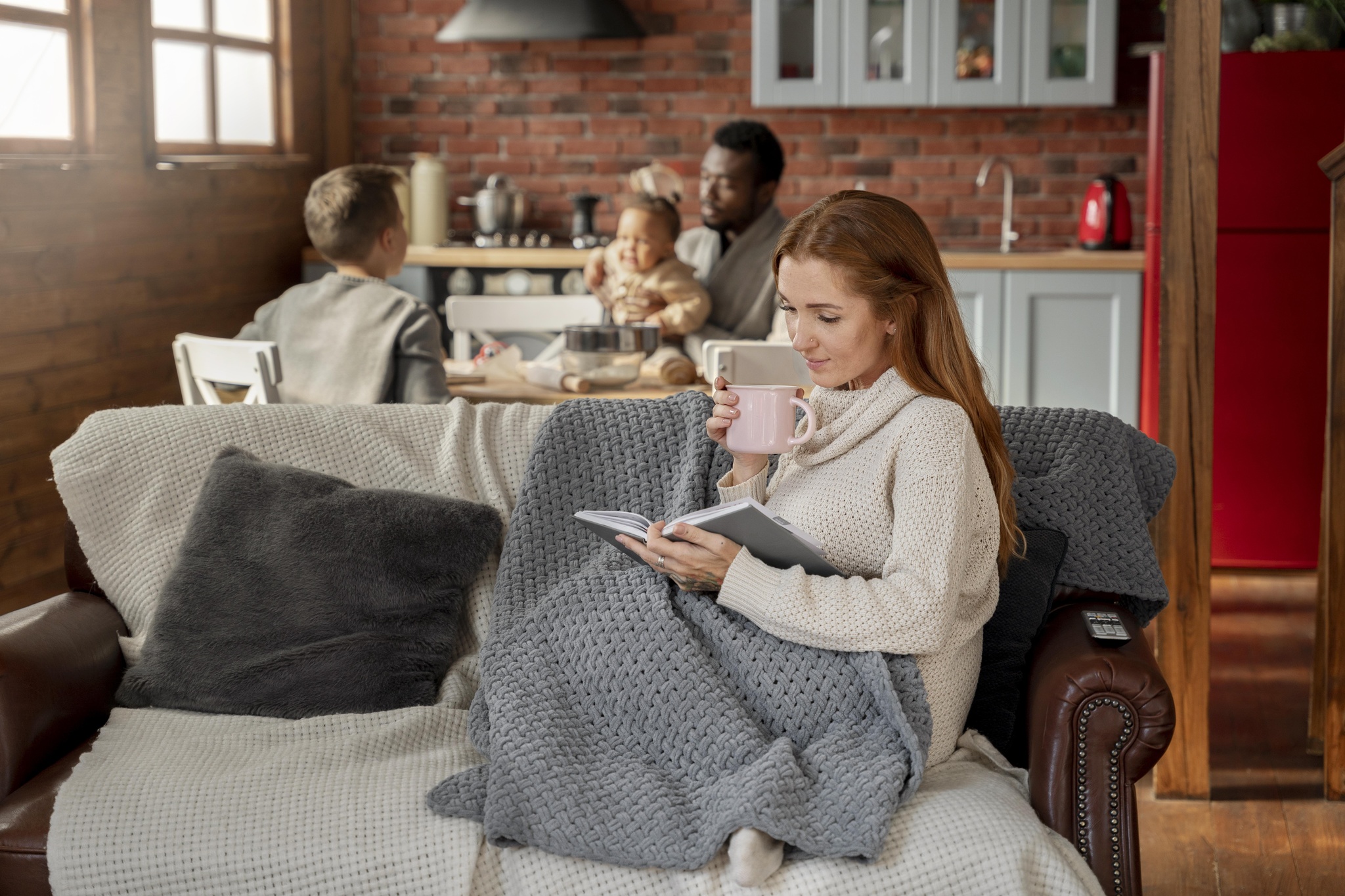 full-shot-woman-reading-couch.jpg