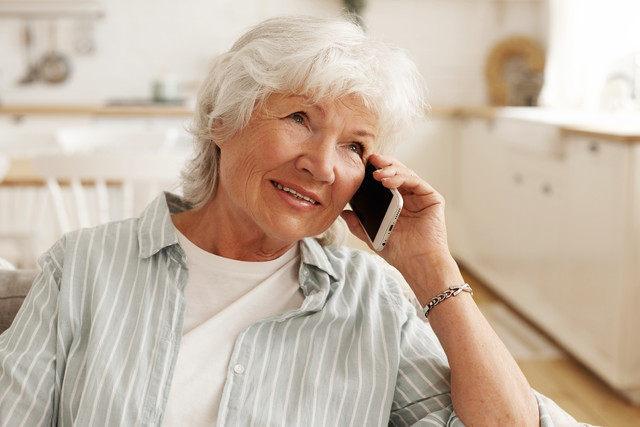 people-modern-electronic-gadgets-technology-communication-aged-senior-woman-with-short-gray-hair-enjoying-nice-phone-conversatio