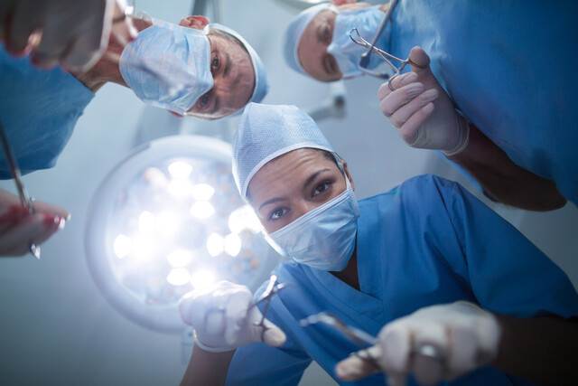 group-surgeons-performing-operation-operation-room.jpg