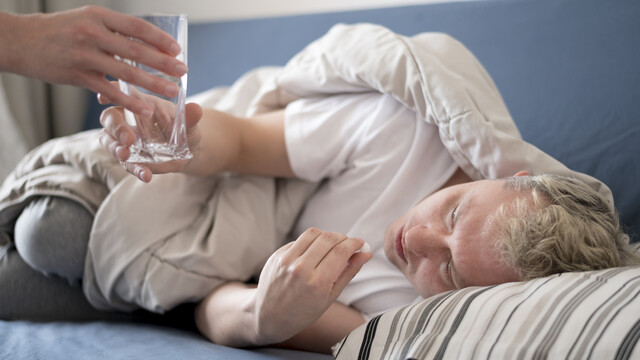 sick-person-receiving-glass-water.jpg