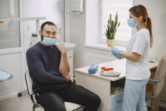 skillful-nurse-is-doing-blood-test-man-clinic-man-medical-mask.jpg