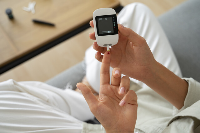top-view-diabetic-woman-checking-her-glucose-level.jpg