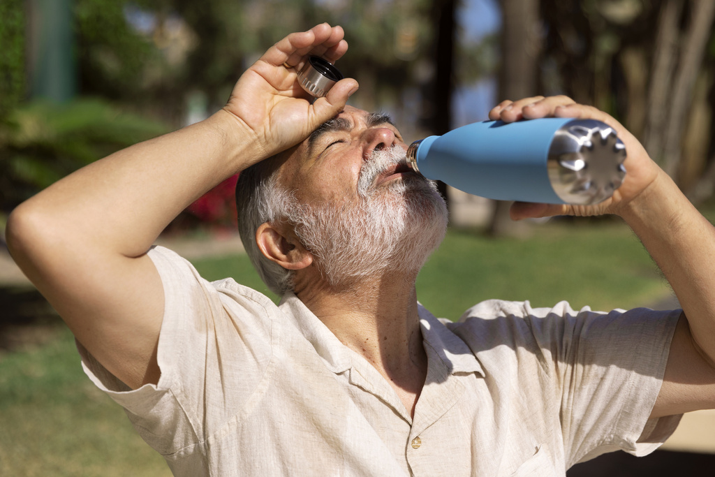 old-man-struggling-with-high-temperature (1).jpg