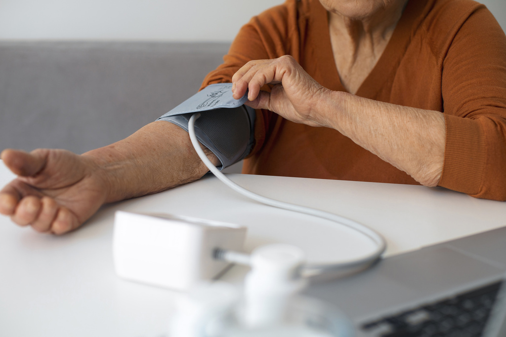 older-person-checking-their-blood-pressure-with-tensiometer.jpg