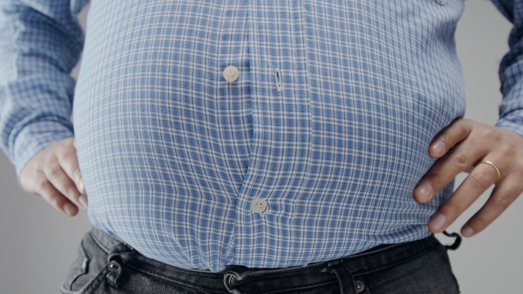 overweight-man-shrt-is-small-him-with-huge-belly-open-buttons (1).jpg