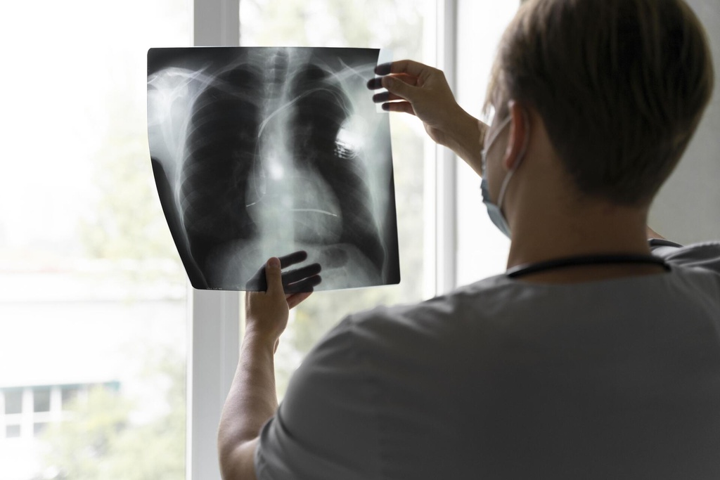 back-view-doctor-looking-radiography.jpg