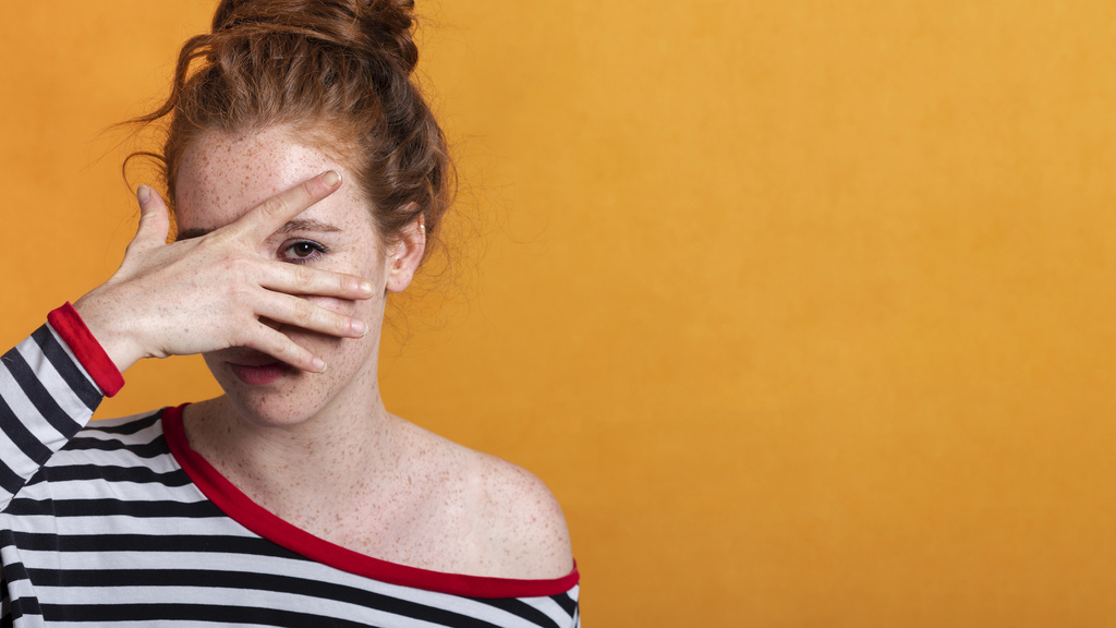 close-up-pretty-woman-with-copy-space-covering-her-face.jpg